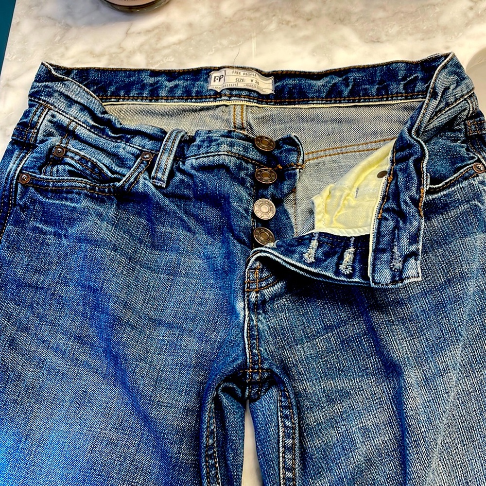 Free People size 26 wide leg distressed hem button fly jeans